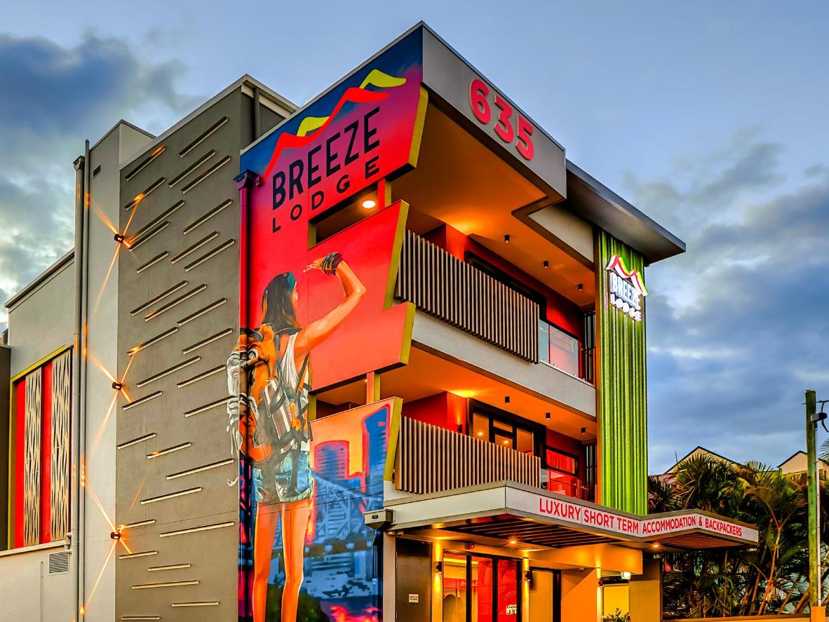Breeze Lodge’s bold facade matches the hostel’s dayglo interiors