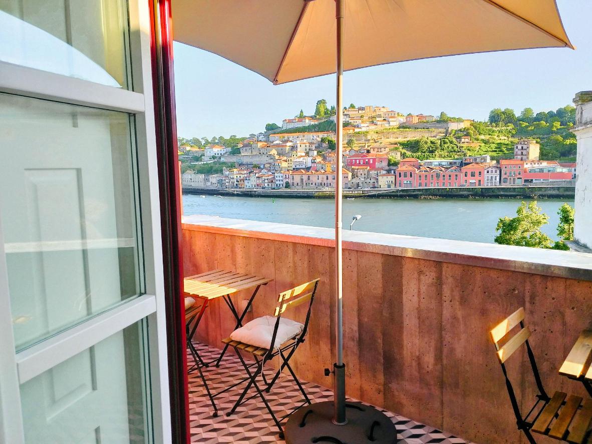 Stroll through the old town and admire the view from the terrace of Wonderful Porto Design Apartments.