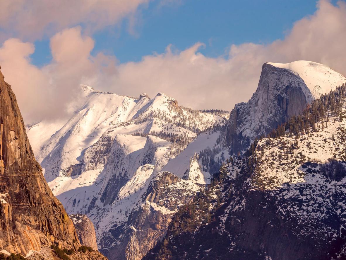 The iconic Half Dome and Glacier Point are visible from the rink