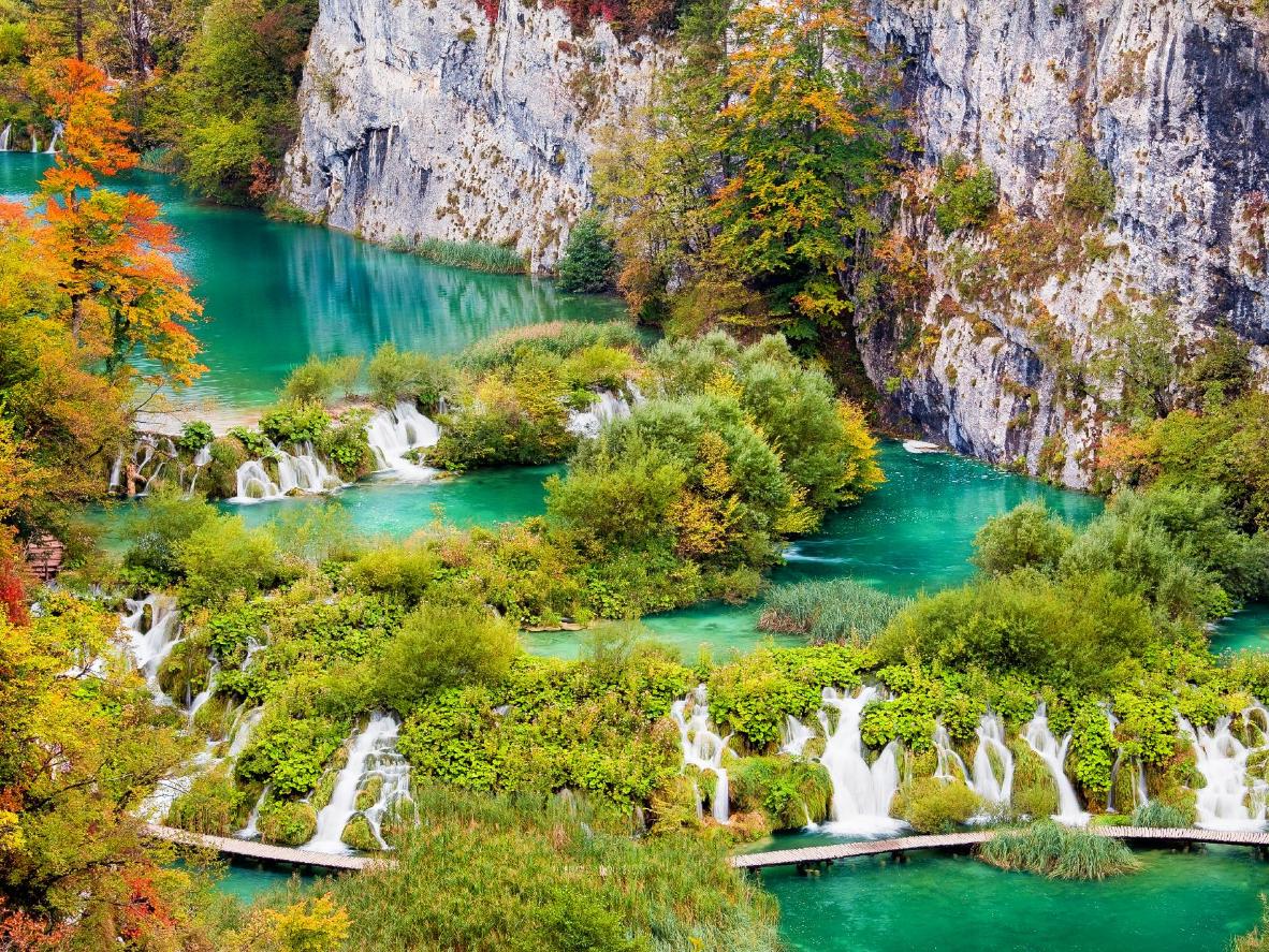 Plitvice Lakes’ pools and falls descend downstream for five miles