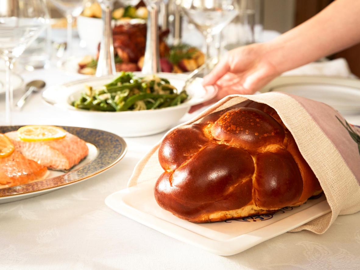 Challah is a symbolic bread, where even the bread cover has importance