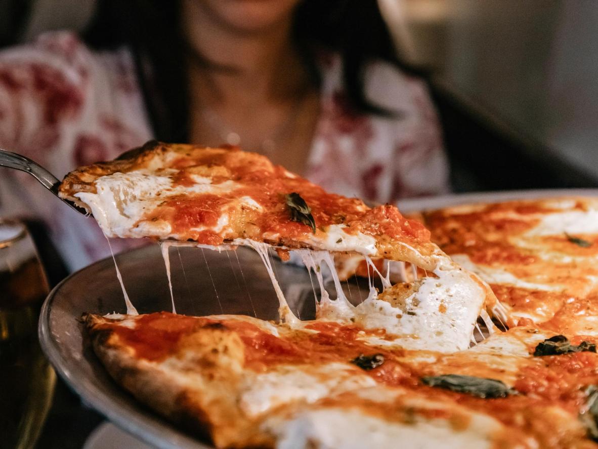 Grab a slice of New York City’s world-famous thin-crust pizza