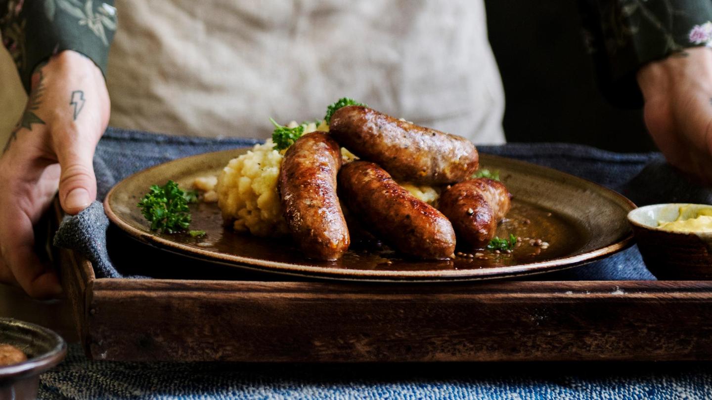Try a classic and comforting dish of 'bangers and mash'